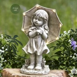 Little Girl With Solar Lighted Umbrella